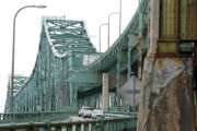 FILE - Drivers take an exit ramp off the Tobin Memorial Bridge, Wednesday, March 31, 2021, in Chelsea, Mass. The Transportation Department is launching a $27 billion program to repair and upgrade roughly 15,000 highway bridges as part of the infrastructure law approved in November. The effort is being announced Friday, Jan. 14, 2022 as President Joe Biden tries to showcase how his policies are delivering for the public. (AP Photo/Steven Senne, File)