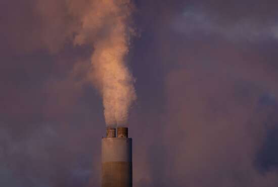 Steam billows from a stack at PacifiCorp's coal-fired Naughton Power Plant, Thursday, Jan. 13, 2022, in Kemmerer, Wyo. (AP Photo/Natalie Behring)
