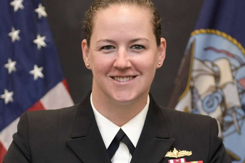 This undated photo released by the U.S. Navy shows U.S. Navy Cmdr. Billie J. Farrell. Farrell is scheduled to become the first woman to lead the crew of the USS Constitution, the 224-year-old warship known as Old Ironsides, during a change-of-command ceremony scheduled for Friday, Jan. 21, 2022. Farrell takes over from Cmdr. John Benda, who has led the ship's crew since February of 2020. (U.S. Navy via AP)