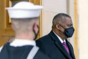 Secretary of Defense Lloyd Austin arrives to greet Emir of Qatar Sheikh Tamim bin Hamad Al Thani during an honor cordon upon his arrival at the Pentagon in Washington, Monday, Jan. 31, 2022. (AP Photo/Andrew Harnik, Pool)