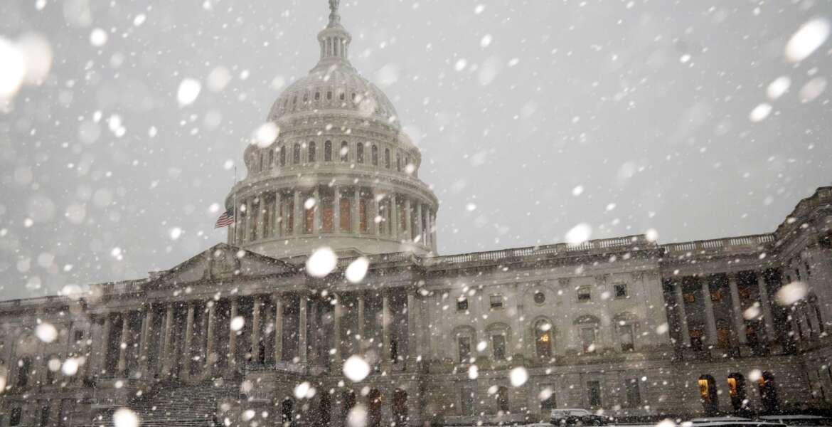 A winter storm delivers heavy snow to the Capitol in Washington, Monday, Jan. 3, 2022. (AP Photo/J. Scott Applewhite)