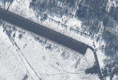 This Feb. 15, 2022 satellite image provided by Maxar Technologies shows attack helicopters deployed at Zyabrovka airfield in Belarus. (Satellite image ©2022 Maxar Technologies via AP)