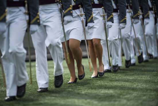 FILE - United States Military Academy graduating cadets march to their graduation ceremony of the U.S. Military Academy class 2021 at Michie Stadium on May 22, 2021, in West Point, N.Y. U.S. officials say reported sexual assaults at the U.S. military academies increased sharply during the 2020-2021 school year, as students returned to in-person classes amid the ongoing pandemic. The increase continues what officials believe is an upward trend at the academies, despite an influx of new sexual assault prevention and treatment programs. (AP Photo/Eduardo Munoz Alvarez, File)