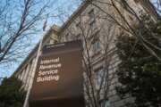 FILE - This April 13, 2014, file photo shows the Internal Revenue Service (IRS) headquarters building in Washington. On Friday, Feb. 4, 2022, The Associated Press reported on stories circulating online incorrectly claiming The IRS will issue a fourth round of stimulus checks to Americans in February 2022. (AP Photo/J. David Ake, File)