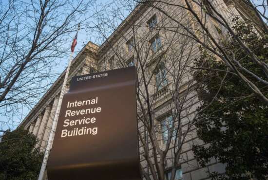 FILE - This April 13, 2014, file photo shows the Internal Revenue Service (IRS) headquarters building in Washington. On Friday, Feb. 4, 2022, The Associated Press reported on stories circulating online incorrectly claiming The IRS will issue a fourth round of stimulus checks to Americans in February 2022. (AP Photo/J. David Ake, File)