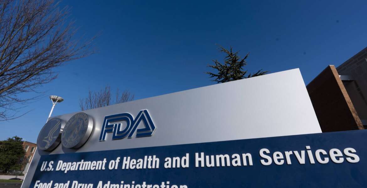 FILE - A sign for the Food and Drug Administration is seen in Silver Spring, Md., on Thursday, Dec. 10, 2020. On Wednesday, March 30, 2022, federal health advisers narrowly ruled against an experimental drug for the debilitating illness known as Lou Gehrig’s disease, a potential setback for patient groups who lobbied for the medication’s approval. A majority of advisers to the FDA voted 6-4 that a single study from Amylyx Pharmaceuticals failed to establish the drug's effectiveness in treating the deadly neurodegenerative disease known also as ALS, for amyotrophic lateral sclerosis. (AP Photo/Manuel Balce Ceneta)
