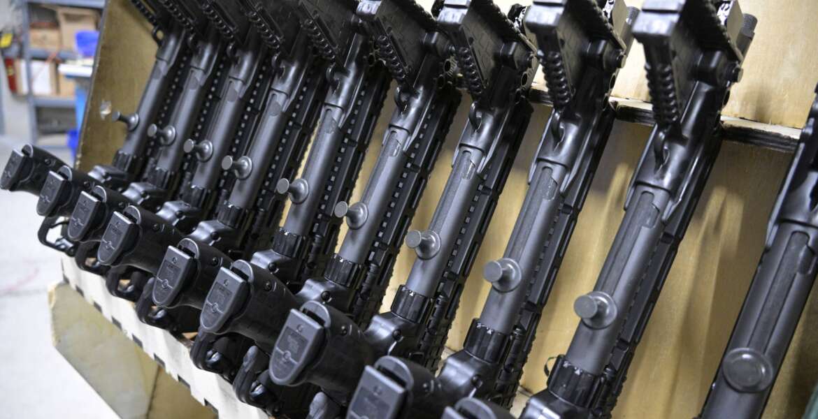 KelTec 9mm SUB2000 rifles, similar to ones being shipped to Ukraine, are viewed in a testing room at a manufacturing facility on Thursday, March 17, 2022, in Cocoa, Fla. The family-owned gun company was left holding a $200,000 shipment of semi-automatic rifles after a longtime customer in Odessa suddenly went silent during Vladimir Putin’s invasion of Ukraine. Fearing the worst, the company decided to put those stranded 400 guns to good use, sending them to Ukraine's nascent resistance movement. (AP Photo/Phelan M. Ebenhack)