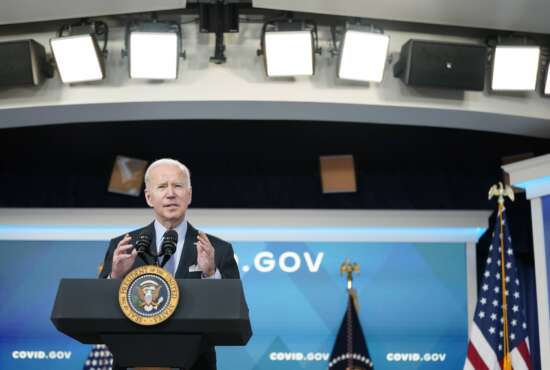 President Joe Biden speaks about status of the country's fight against COVID-19 in the South Court Auditorium on the White House campus, Wednesday, March 30, 2022, in Washington. (AP Photo/Patrick Semansky)