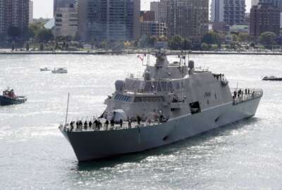 FILE - The USS Detroit, a Freedom-class of littoral combat ship, arrives Friday, Oct. 14, 2016, in Detroit. The Navy that once wanted smaller, speedy warships to chase down pirates has made a speedy pivot to Russia and China and many of those ships, like the USS Detroit, could be retired. The Navy wants to decommission nine ships in the Freedom-class, warships that cost about $4.5 billion to build. (AP Photo/Carlos Osorio, File)