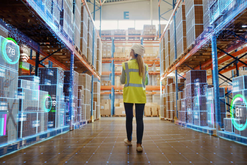 Futuristic Technology Retail Warehouse: Worker Doing Inventory Walks when Digitalization Process Analyzes Goods, Cardboard Boxes, Products with Delivery Infographics in Logistics, Distribution Center