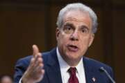 FILE - Department of Justice Inspector General Michael Horowitz testifies during a Senate Judiciary hearing on Capitol Hill, Sept. 15, 2021, in Washington. Inspectors general need more authority to go after fraud in the COVID-19 relief programs, the independent committee overseeing federal pandemic relief spending said Tuesday, May 31, 2022. Horowitz, head of the committee, said the $150,000 threshold is far too low given the scope of the fraud in programs set up to help businesses and people who lost their jobs due to the pandemic. (Graeme Jennings/Pool via AP, File)