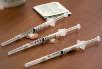 FILE - Doses of the Moderna COVID-19 vaccine wait to be administered during a vaccination clinic in Odessa, Texas, on Tuesday, Aug. 24, 2021. On Thursday, June 23, 2022, an expert panel is recommending Moderna's COVID-19 shots for kids ages 6 to 17, marking another step toward bringing a second brand of vaccine for kids in that age group. (Eli Hartman/Odessa American via AP, File)