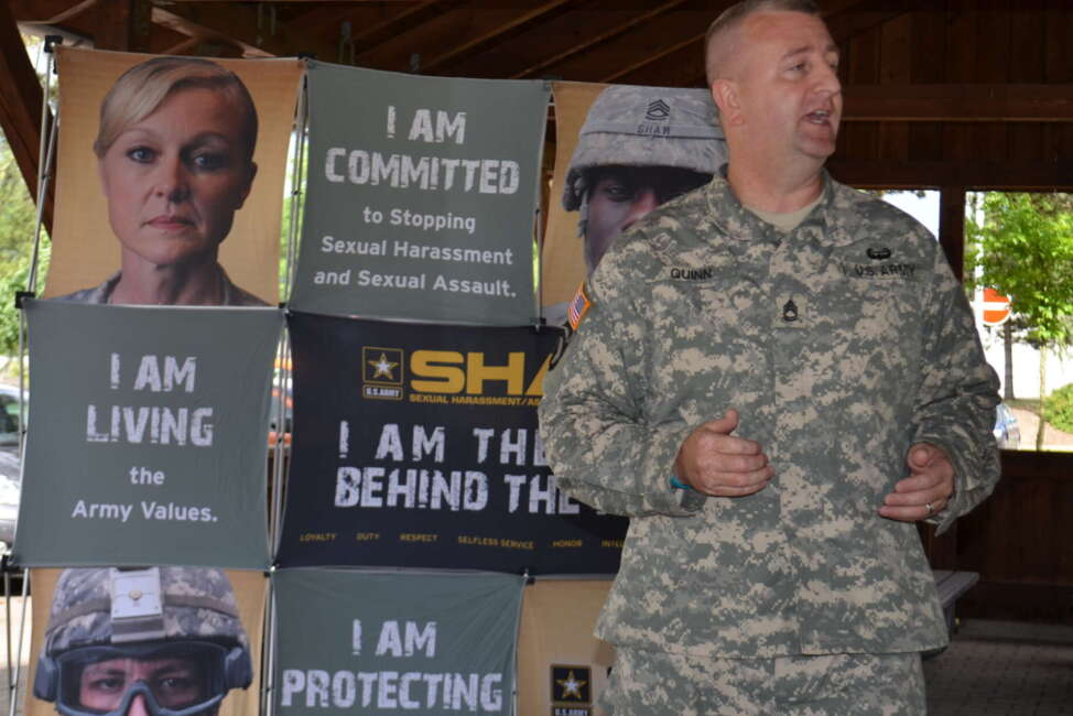 U.S. Army Sgt. 1st Class Stanley Quinn, the Sexual Assault Response Coordinator for the 10th Army Air and Missile Defense Command, speaks to a group of soldiers at Rhine Ordnance Barracks in Kaiserslautern, Germany on June 21. The soldiers were undergoing Sexual Harassment/Assault Response and Prevention training, and the sessions revolved around Quinn raising points of discussion which Soldiers further elaborated upon. Quinn frequently trains Soldiers on the guidance provided in the Army's Sexual Harassment/Assault Response and Prevention policies, with the ultimate goal being to significantly reduce the incidents affecting the armed forces. (Photo by Staff Sgt. John Zumer, 10th AAMDC Public Affairs)