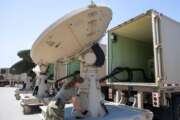 U.S. Air Force Staff Sgt. Rhyan Acey performs maintenance on the AN/TSQ-180 Milstar Communications Vehicle July 30, 2021, at the 233rd Space Group, Greeley Air National Guard Station, Greeley, Colorado. The 233rd Space Group was the first National Guard unit to assume a U.S. Space Command mission. (U.S. Air National Guard photo by Master Sgt. Amanda Geiger)