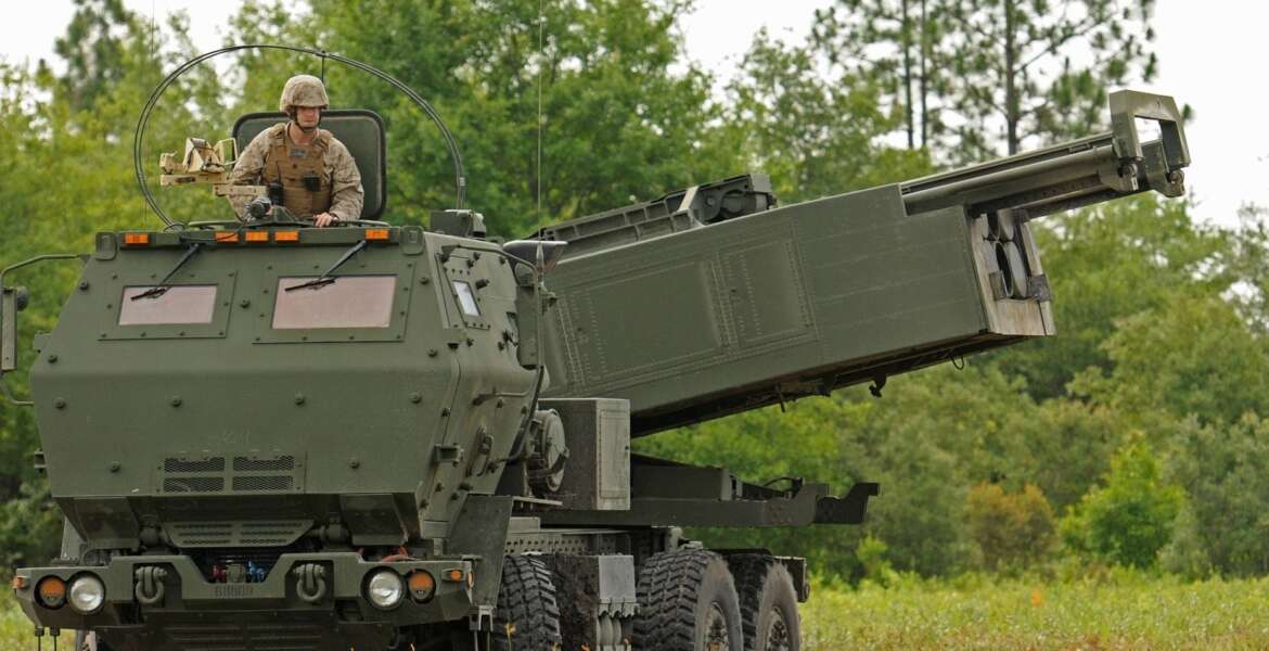 FILE - Marine Corps Sgt. Justin Russell, a High Mobility Artillery Rocket System, or HIMARS, section chief with Kilo Battery, 2nd Battalion, 14th Marines looks out over a firing range at Fort Stewart, Ga. during a training exercise, Saturday, June 13, 2015. The HIMARS systems supplied by the U.S. and similar M270 provided by Britain have significantly bolstered the Ukrainian army's precision strike capability. (Corey Dickstein/Savannah Morning News via AP, File)