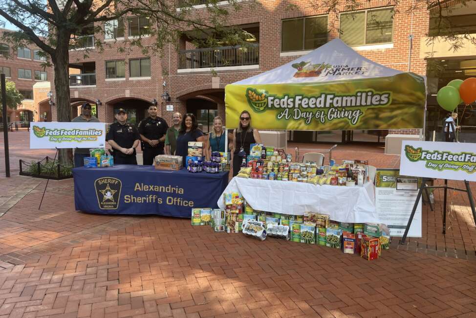 USDA employees and Alexandria Sheriff’s department participate in the 2nd annual Feds Feed Families “Stuff the Truck” event in Alexandria, VA on August 10, 2022. USDA employees nationwide are encouraged to participate with the Day of Giving activities and conduct Stuff the Truck events on August 10th. USDA photo by Emily Buday