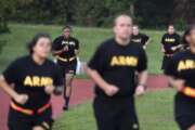 Students in the new Army prep course run around a track during physical training exercises at Fort Jackson in Columbia, S.C., Saturday, Aug. 27, 2022. The new program prepares recruits for the demands of basic training. (AP Photo/Sean Rayford)