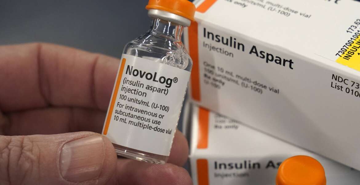 FILE - Insulin is displayed at Pucci's Pharmacy in Sacramento, Calif., July 8, 2022. The biggest investment ever in the U.S. to fight climate change. A hard-fought cap on out-of-pocket prescription drug costs for seniors in the Medicare program. A new corporate minimum tax to ensure big businesses pay their share. And billions leftover to pay down federal deficits.(AP Photo/Rich Pedroncelli, File)