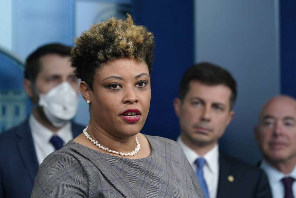 FILE - Office of Management and Budget director Shalanda Young, second from left, speaks during a briefing at the White House in Washington, May 16, 2022. The Biden administration is forecasting that this year’s budget deficit will be nearly $400 billion lower than it estimated back in March. “The President’s top economic priority continues to be tackling the challenge of inflation, without giving up the historic economic gains we’ve made over the past 18 months,” said Young. (AP Photo/Susan Walsh, File)