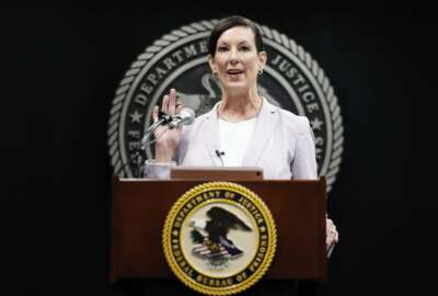 Colette Peters, director of the federal Bureau of Prisons, speaks after being sworn in at BOP headquarters in Washington, Tuesday, Aug. 2, 2022. (Evelyn Hockstein/Pool Photo via AP)