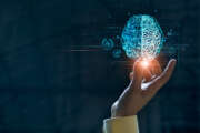 Hand touching brain of AI, Symbolic, Machine learning, artificial intelligence of futuristic technology. AI network of brain on business analysis, innovative and business growth development.