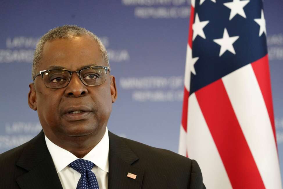 FILE - Secretary of Defense Lloyd Austin talks during ta news conference with Minister of Defence of Latvia Artis Pabriks in Riga, Latvia, Aug. 10, 2022. The Pentagon will set up a new center in the next year to help avoid civilian casualties in military operations around the world, through better education and training and increased vetting before strikes are launched. (AP Photo/Roman Koksarov, File)