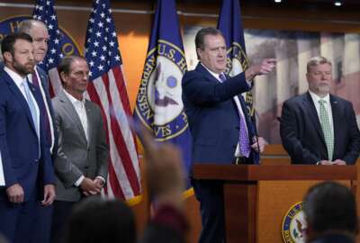 House Intelligence Committee ranking member Rep. Mike Turner, R-Ohio, second from right, joined by other Republicans on the committee, calls on a reporter during a news conference on Capitol Hill in Washington, Friday, Aug. 12, 2022, on the FBI serving a search warrant at former President Donald Trump's home in Florida. (AP Photo/Susan Walsh)
