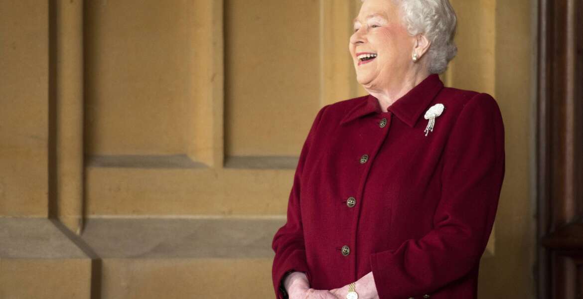 FILE - Britain's Queen Elizabeth II laughs as Irish President Michael D. Higgins and his wife Sabina prepare to leave Windsor Castle in Windsor, southern England on April 11, 2014, at the end of their official visit. Elizabeth often gave the impression of seriousness and many have noted her “poker face,” but those who knew her described her as having a mischievous sense of humor and a talent for mimicry in private company. Rowan Williams, the former Archbishop of Canterbury, has said the queen could be “extremely funny in private _ and not everybody appreciates how funny she can be.” (Leon Neal, Pool Photo via AP, File)