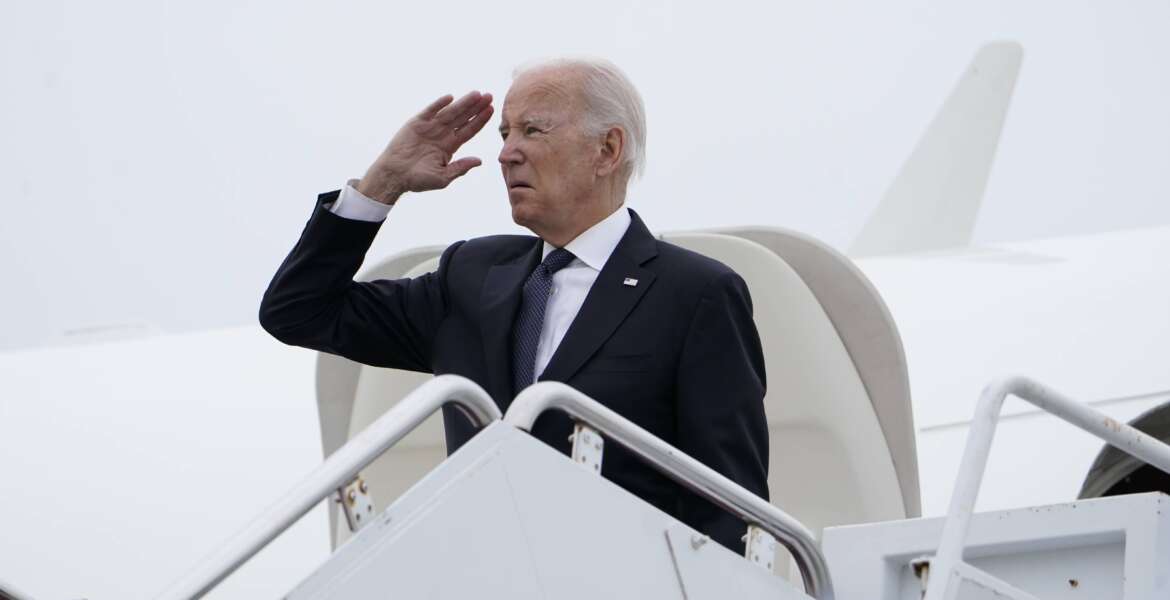 President Joe Biden salutes as he boards Air Force One at Delaware Air National Guard Base in New Castle, Del., Sunday, Sep. 11, 2022. Biden will mark the 21st anniversary of the Sept. 11 attacks at the Pentagon. Sunday's somber commemoration comes a little more than a year after the Democratic president ended the war in Afghanistan launched by the U.S. and its allies in response to the terror attacks. (AP Photo/Manuel Balce Ceneta)