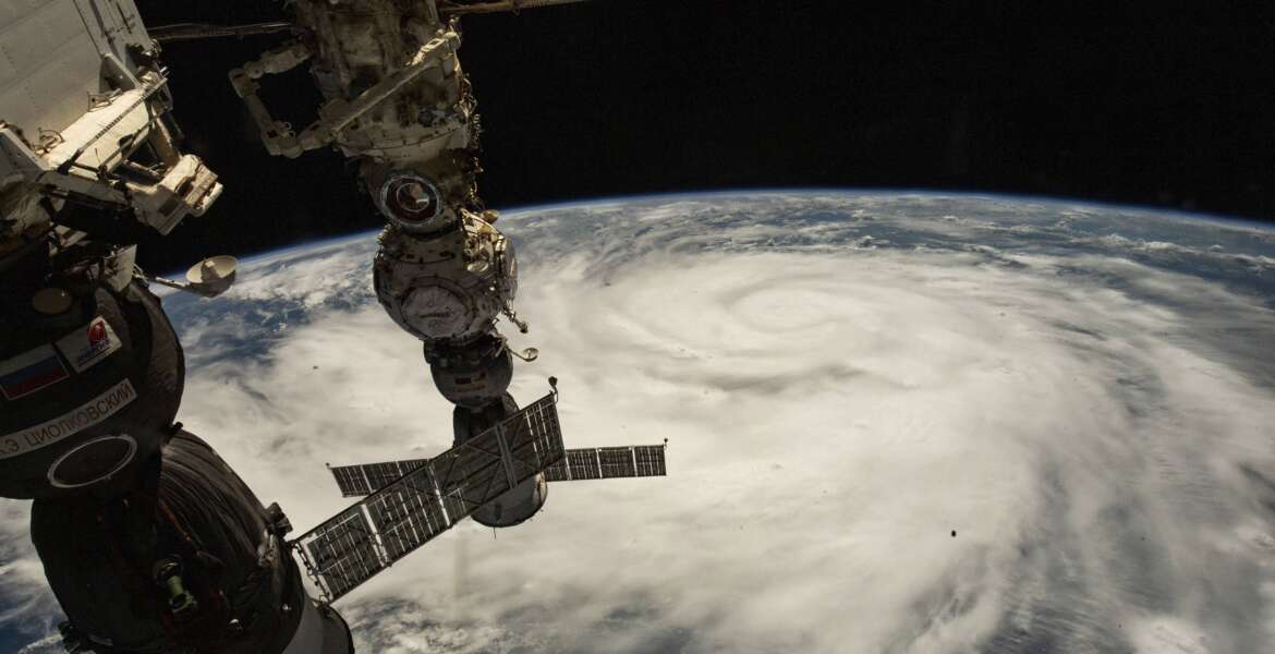This Satellite image provided by NASA on Sept. 26, 2022, shows Hurricane Ian pictured from the International Space Station just south of Cuba gaining strength and heading toward Florida.  Hurricane Ian rapidly intensified off Florida's southwest coast Wednesday, Sept. 28, gaining top winds of 155 mph (250 kph), just shy of the most dangerous Category 5 status. (NASA via AP)
