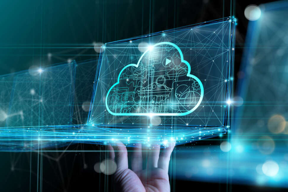 Hand showing laptop computer with cloud network Computer connects to internet server service for cloud data transfer.Cloud computing technology and online data storage for business network concept.