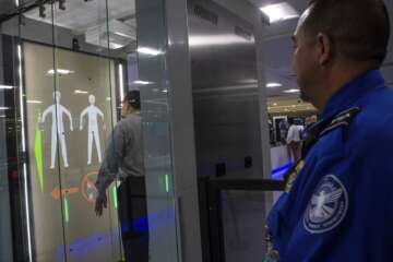 TSA officials demonstrate new airport self screening prototype