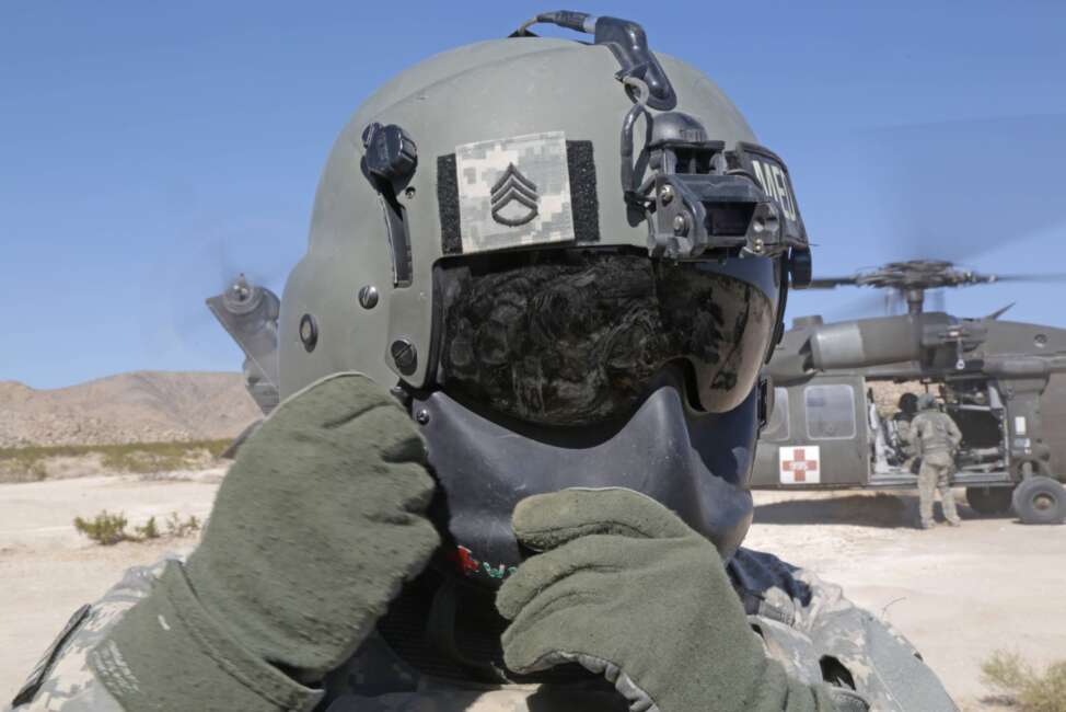  U.S. Army Soldiers from Alpha Battery, 2nd Battalion 29th Field Artillery Regiment, await a medical evacuation the Decisive Action Rotation 14-10 at the National Training Center in Fort Irwin, Calif., Sept. 13, 2014. The decisive action training environment rotations were developed to create a common training scenario for use throughout the Army. (U.S. Army photo by Sgt. Charles Probst) 