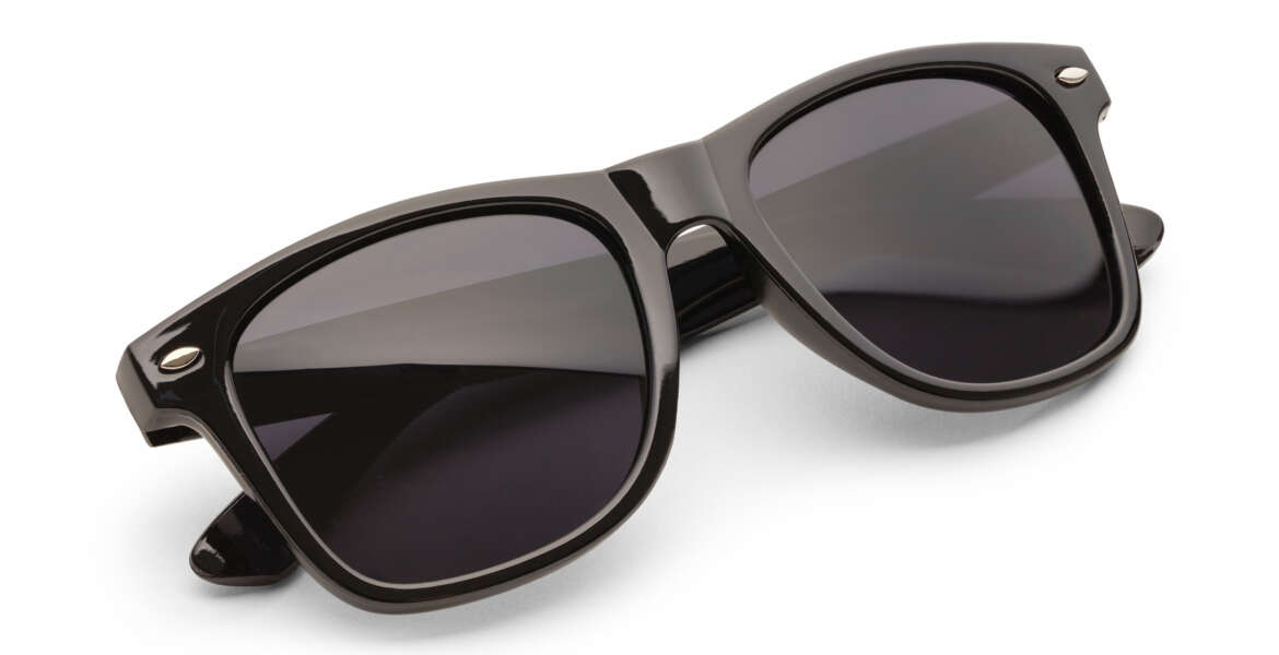 Folded Black Sunglasses Isolated on White Background with Clipping Path.