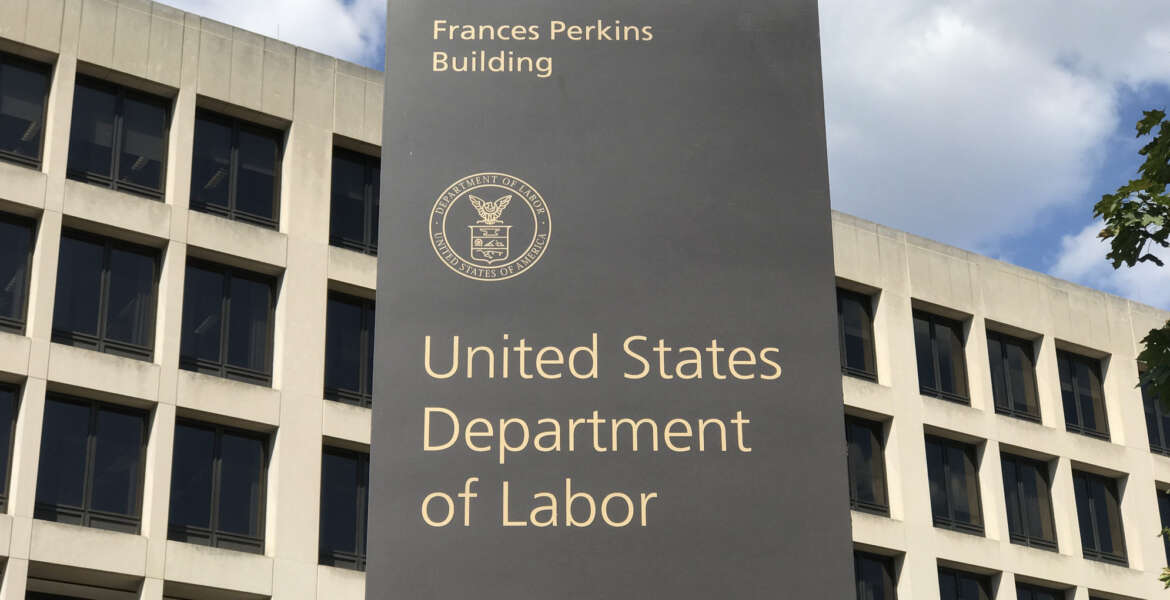 Washington DC USA , Sep 03 2019 : Labor sign and building.
