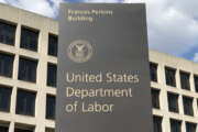 Washington DC USA , Sep 03 2019 : Labor sign and building.