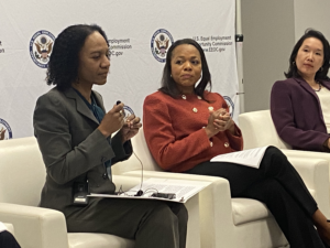 EEOC Chairwoman Charlotte Burrows speaking during a panel at EEOC headquarters.