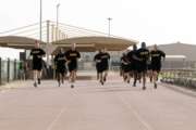  Soldiers assigned to 3rd Expeditionary Sustainment Command complete the two-mile run event during an Army Combat Fitness Test at Camp Arifjan, Kuwait, April 21, 2022. Photo by Sgt. 1st Class Mary Katzenberger