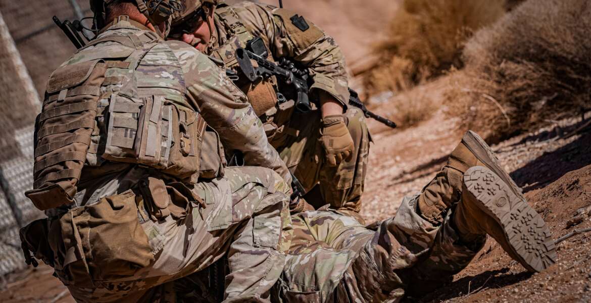 Soldiers in the Army National Guard conduct a security search