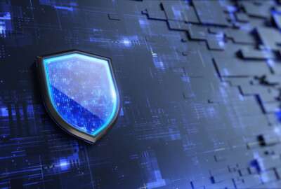 zero trust, cybersecurity defense shield on blue background