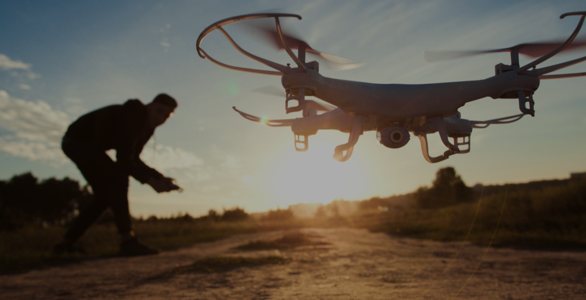 flying drone in field