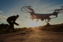 flying drone in field