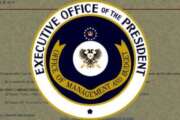 The Seal of the Office of Management and Budget (OMB) imposed over a document.