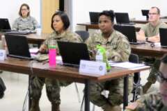 Army Human Resources, U.S. Army Reserve Sgt. 1st Class Jena McKinny and Sgt. Keila Orozco, human resources NCOs from the 350th Human Resources Company headquartered in Grand Prairie, Texas, receive training on the Defense Joint Military Pay System at Fort McCoy, Wisconsin.