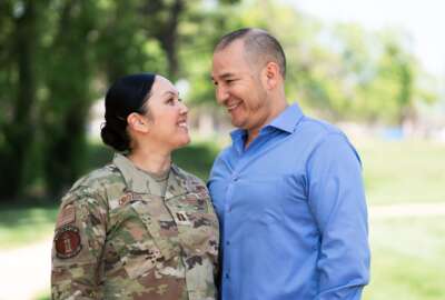U.S. Air Force Capt. Jennifer Orozco, 60th Medical Operations Squadron clinical social worker and her spouse, Josue, participate in the Military Spouse Appreciation Day campaign at Travis Air Force Base, California, April 7, 2022.