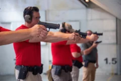 ICE Enforcement and Removal Operations (ERO) firearms instructors take aim at their targets during a training session at the Federal Law Enforcement Training Center (FLETC) in Glencoe, Georgia on April 12, 2022.