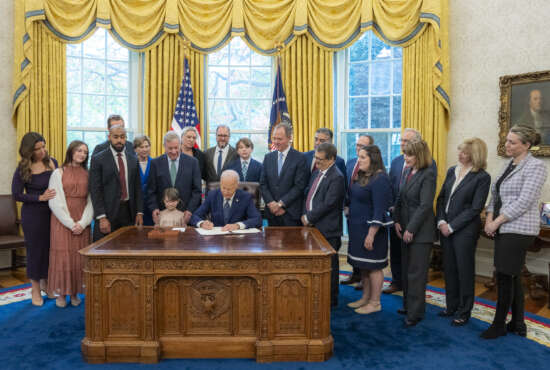 President Joe Biden signs the Congenital Heart Futures Reauthorization Act