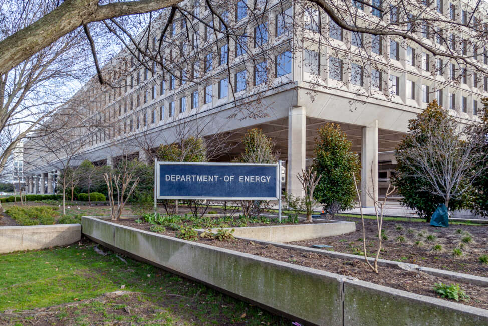 Sign of U.S. Department of Energy outside their headquarters building