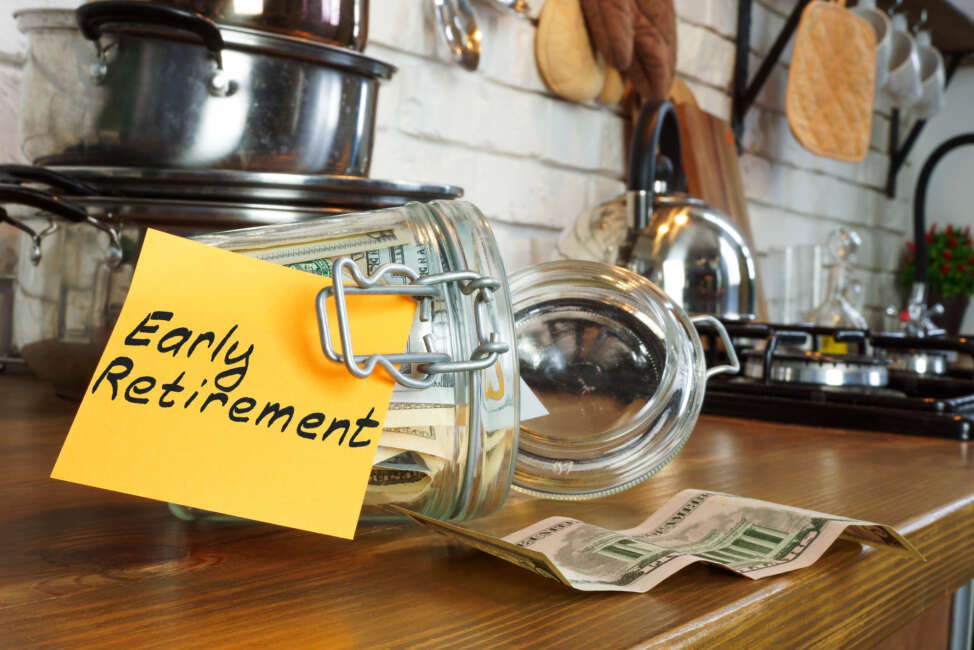 Glass jar with money on the home table