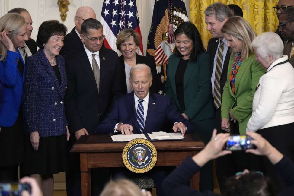 President Joe Biden signs the Social Security Fairness Act during a ceremony in the East Room of the White House, Sunday, Jan. 5, 2025, in Washington.